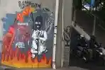 Mural Kritik UU Omnibus Law Cipta Kerja