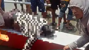 Tim-gabungan-mengevakuasi-jasad-nelayan-Desa-Tampaure-Kecamatan-Bambaira.jpg