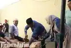 berita-kediri-kapolres-kediri-menyembelih-sapi-kurban.jpg