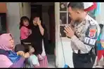 Anggota-Satlantas-Polres-Bogor-mengantarkan-MA-9-bocah-asal-Cimanggis-Depok.jpg