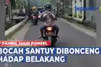 VIDEO - Viral Bocah Santuy Dibonceng Hadap Belakang Sambil Main Ponsel