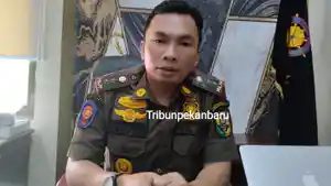 Kepala-Satpol-PP-PKP-Kabupaten-Kuansing-Rio-Kasyterwandra.jpg