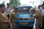 ANGKUTAN-GRATIS-Wali-Kota-Bitung-Hengky-Honandar-dan-Wakil-Wali-Kota.jpg