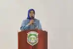 Sekretaris-Perpusip-Sulbar-Hj-Nursina-Achir-Parampasi-saat-memberi-sambutan.jpg