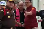 Tangan-Diborgol-Dadan-Hindayana-Langsung-Diseret-ke-Tahanan-Resmi-Tersangka.jpg