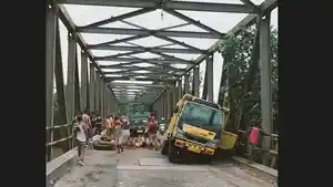 Jembatan-Titi-Besi-yang-di-Desa-Bah-Sidua-Dua-Kecamatan-Serbajadi.jpg