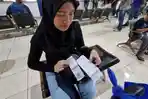Sunarsih-gagal-mudik-menjadi-korban-penipuan-tiket-di-Terminal-Poris-Plawad.jpg