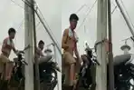 video-viral-sebuah-motor-digantung-di-atas-tiang-listrik-di-Kendari-Sultra.jpg