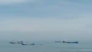 Barisan-kapal-nelayan-terparkir-di-laut-Dusun-Tanjung-Parappa-Kelurahan-Pasangkayu.jpg
