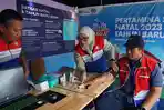 Para-petugas-medis-saat-melakukan-pengecekan-kesehatan-di-Posko-Medis-Pertamina.jpg