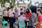 Pasar BTN Way Pengubuan Disambangi Gerakan Pangan Murah Polres Lampung Tengah