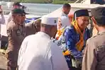 Pasutri-Senayang-Lingga-pulang-haji.jpg