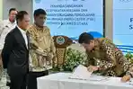 Bupati-Minut-Dr-Joune-Ganda-teken-kerja-sama-dengan-Kementerian-LH.jpg