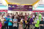 Sekretaris-Daerah-Sekda-Merangin-Zulhifni-bersama-Ketua-TP-PKK-Ny.jpg