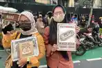 massa-aksi-demo-membawa-sejumlah-atribut-seperti-poster.jpg