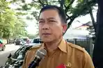 kabid-smp-dinas-pendidikan-palembang-herman-wijaya.jpg