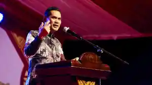 M-Nasir-saat-membacakan-sambutan-Gubernur-Aceh.jpg