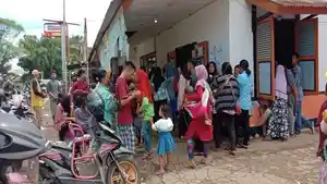 pencairan-bantuan-di-kantor-pos-PALI.jpg