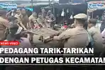 tarik-tarikan-dengan-pedagang.jpg