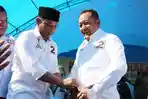calon-bupati-luwu-patahuddin-saat-memasangkan-pakaian-tim-ke-wahyu-napeng_20180506_180902.jpg