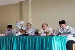 Zulinto-PGRI-dan-Riza-Pahlevi.jpg