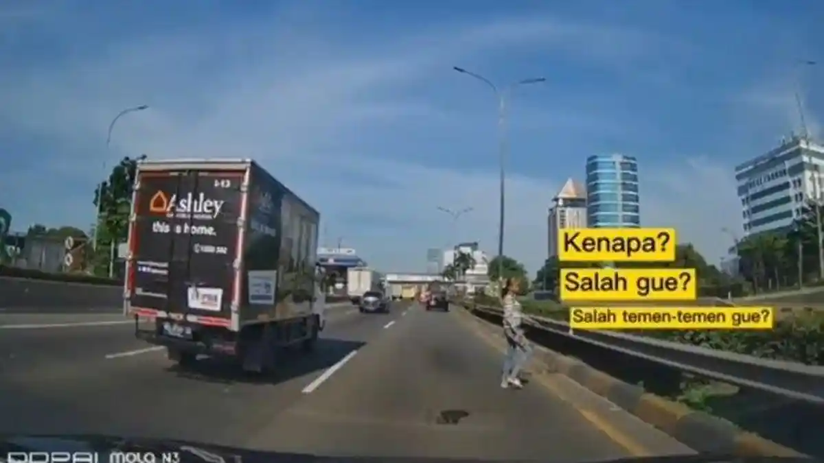 Viral Video Emak-emak Menyeberang Jalan Tol dengan Santai, Polisi Masih Cari Identitasnya