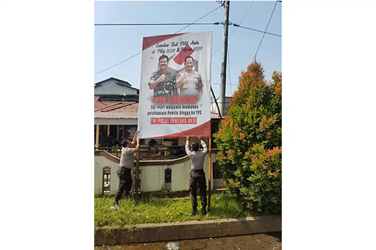 Pasang Banner di Lokasi Strategis, Polsek Pontianak Utara Tekankan TNI Polri Jamin Keamanan Pemilu
