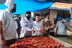 wakil-wali-kota-langsa-h-marzuki-hamid-saat-memantau-harga-bahan-pangan.jpg