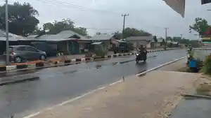 hujan-di-manggar.jpg