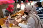 IOH Sapa Pelanggan di Harpelnas 2022
