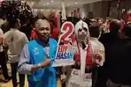 atusan-pendukung-Edy-Hasan-yang-didominasi-seragam-merah-sempat-membuat-heboh.jpg