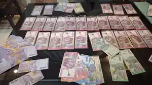 Ratusan-lembar-uang-mainan-yang-diduga-akan-digunakan-Kunci-Wasiati.jpg