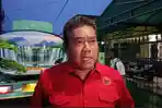 Politisi-partai-PDIP-Sumut-Sutrisno-Pangaribuan-ketika-diwawancarai-usai-mengantre.jpg