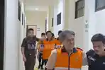 Terdakwa-korupsi-belanja-fiktif-satpol-pp-basel-keluar-sidang.jpg