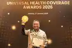 Bupati-Rohul-Anton-ST-MM-saat-menerima-penghargaan-UHC-Awards-2026.jpg