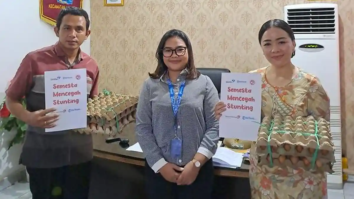 Tribun Manado Kembali Salurkan Ratusan Telur di Mapanget, Program Semesta Mencegah Stunting