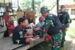 Satgas Yonif 126/KC Baksos Di Perbatasan RI-PNG