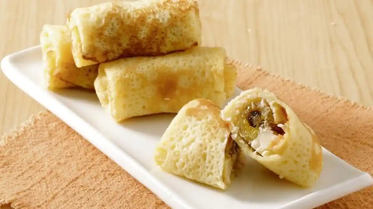 Resep Dadar Gulung Kelapa Pisang Keju, Modifikasi Camilan Tradisional yang Gurih dan Manis