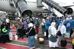 ilustrasi-kedatangan-jemaah-haji-jawa-timur-di-Bandara-Juanda-Surabaya.jpg