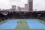 Penyemprotan Disinfektan di Tennis Indoor Senayan