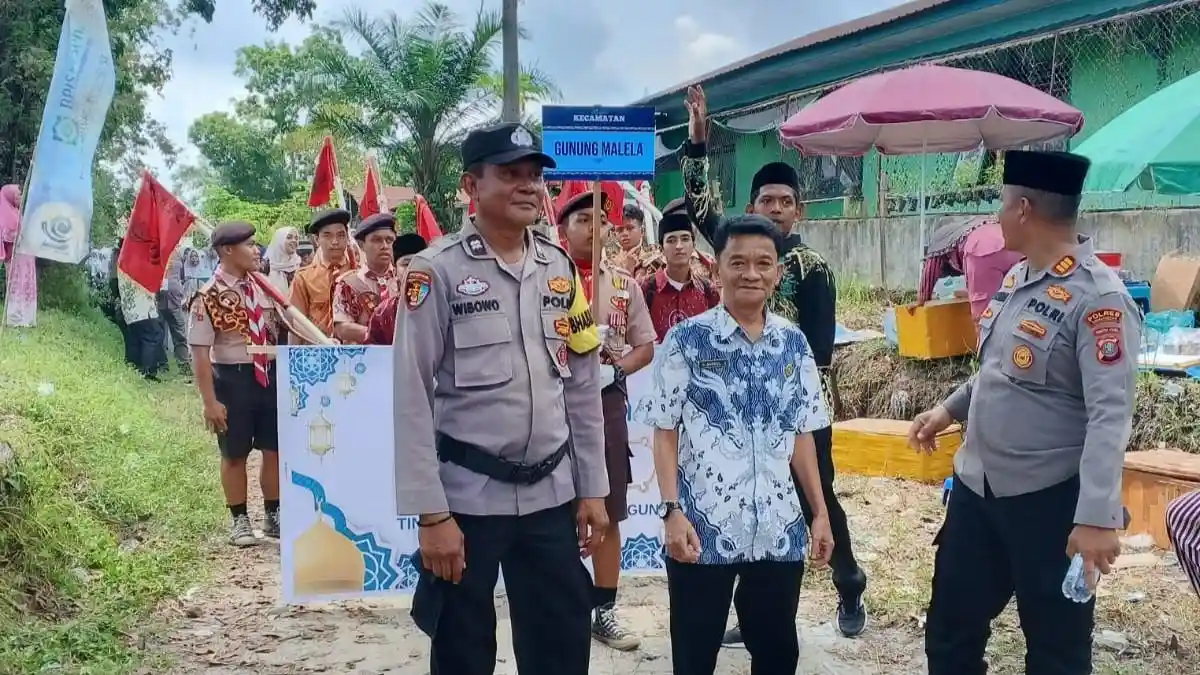 Kapolsek Gunung Malela Dampingi Devile Kontingen MTQ ke-52 Kabupaten Simalungun