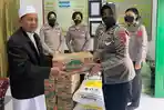 Polisi-Wanita-Polda-Sulawesi-Tenggara-Bakti-Sosial-di-Panti-Asuhan-Peringati-Hari-Jadi-Polwan-ke-74.jpg