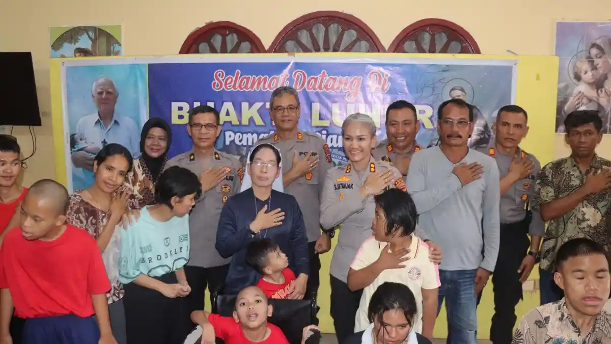 Kapolres Pematangsiantar Berbagi Kebahagiaan dengan Anak Panti Asuhan