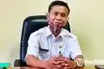 Kepala-Dinas-Pertanian-Lumajang-Hairil-Diani-merespon-penetapan-tersangka-korupsi.jpg