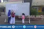 suasana-pengumuman-siswa-yang-diterima-di-smpn-2-kota-malang-kamis-1272018_20180712_201615.jpg