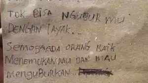 Surat-dari-orang-tua-bayi-yang-ditemukan-di-Kelurahan-Sading.jpg