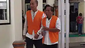Terdakwa-Puthut-Gunawan-Made-Suma-dan-Made-Alit-usai-menjalani-sidang-perdana.jpg
