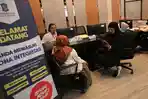 layanan-dispenduk-Surabaya-penandaan-suami.jpg