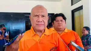 Bupati-Kaimana-Papua-Barat-Drs-Hasan-Achmad-E.jpg