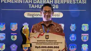 PENGHARGAAN-Wali-Kota-Bitung-Hengky-Honandar-ass.jpg